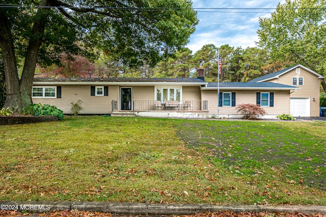 ranch-style home with a front yard