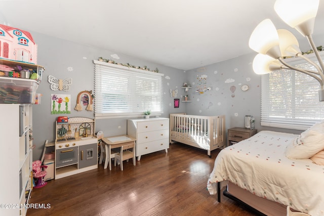 bedroom featuring dark wood-type flooring