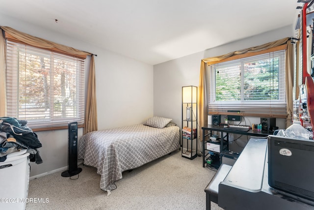 bedroom featuring carpet flooring