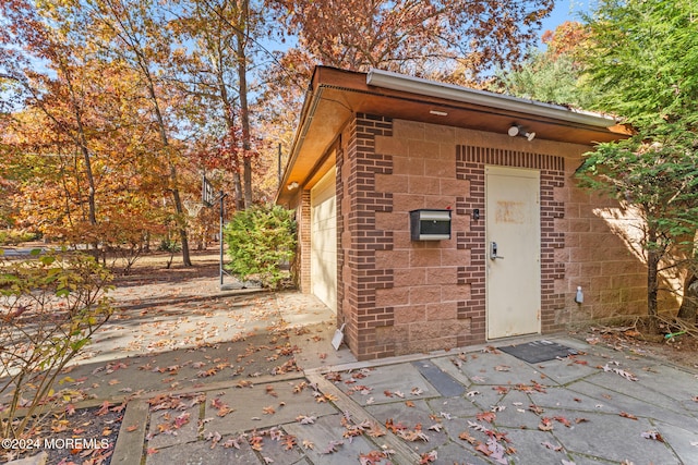 exterior space with a garage