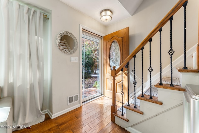 foyer featuring hardwood / wood-style floors