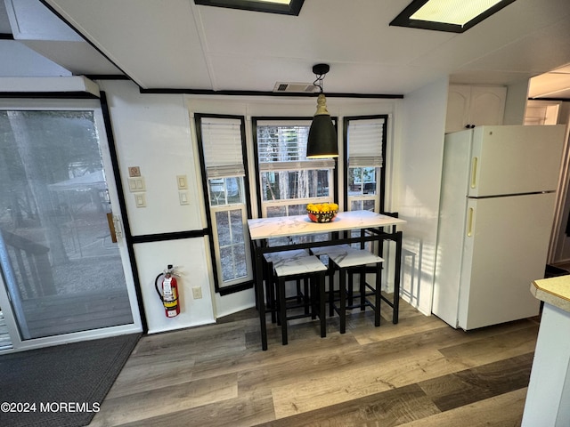 dining area with light wood-type flooring