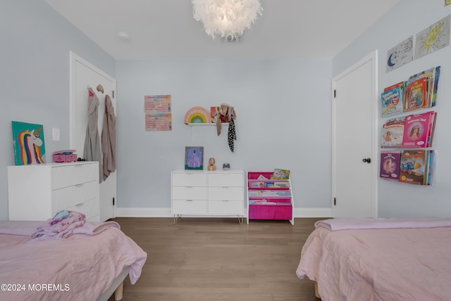 bedroom featuring hardwood / wood-style flooring