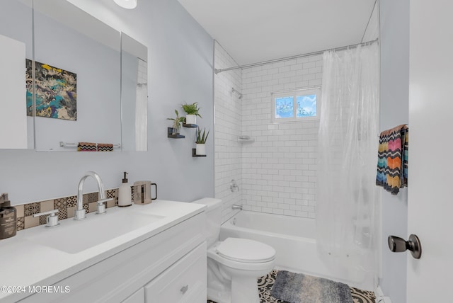 full bathroom with shower / bath combo, vanity, and toilet