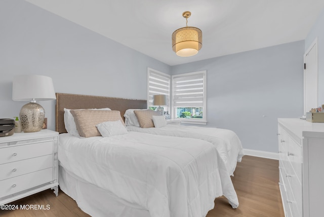 bedroom featuring hardwood / wood-style floors