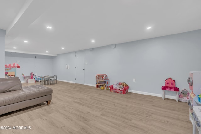 game room featuring light hardwood / wood-style floors