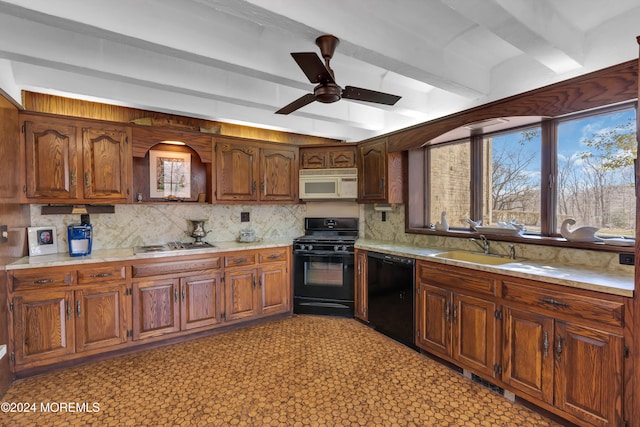 kitchen featuring decorative backsplash, black appliances, sink, ceiling fan, and beam ceiling