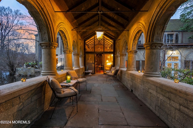 view of patio terrace at dusk