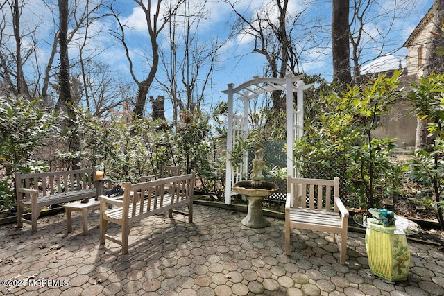 view of patio featuring a pergola