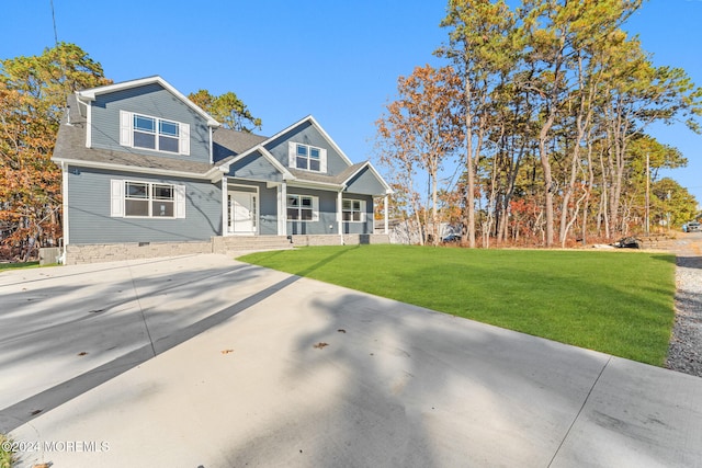 craftsman-style home featuring a front lawn