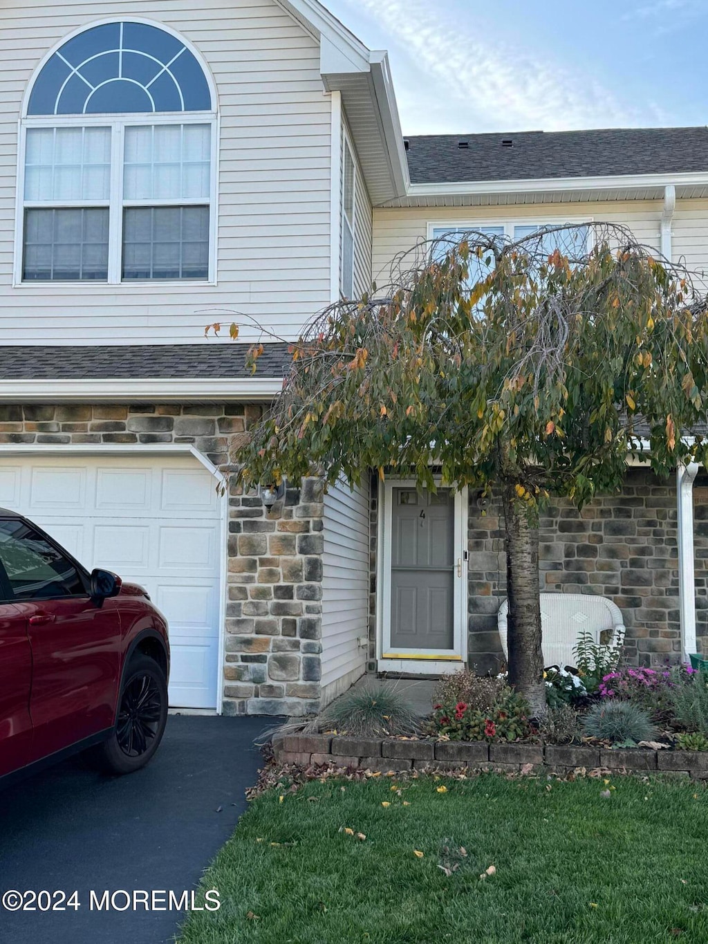 property entrance featuring a garage