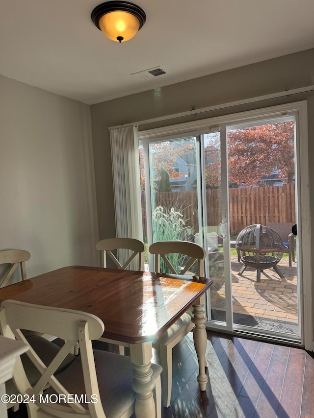 dining area featuring hardwood / wood-style flooring