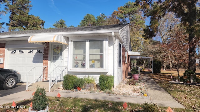 view of front of property featuring a garage