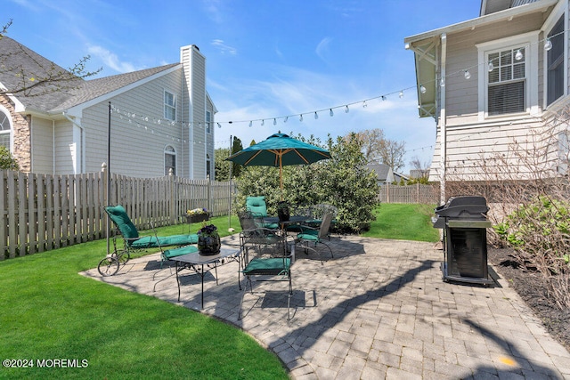 view of patio / terrace featuring a grill