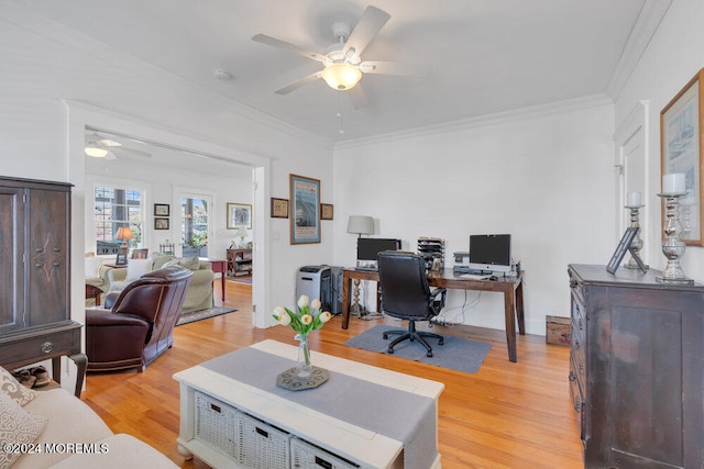 office area featuring light hardwood / wood-style flooring, ceiling fan, and crown molding