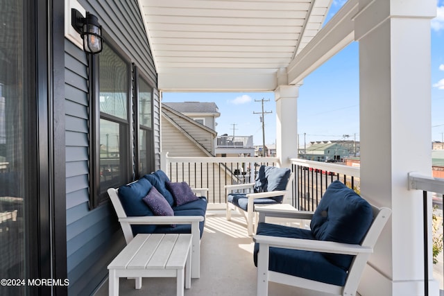 balcony with an outdoor hangout area