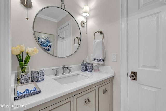 bathroom featuring vanity and crown molding