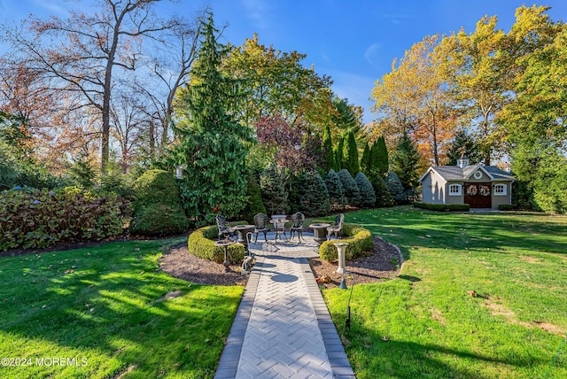 25 Bruns Rd, West Allenhurst, NJ 07711 - view of grassy yard featuring a patio and an outdoor structure