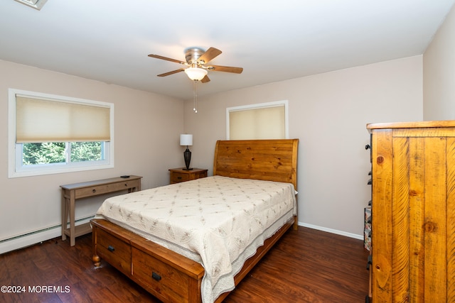 bedroom with ceiling fan and dark hardwood / wood-style floors