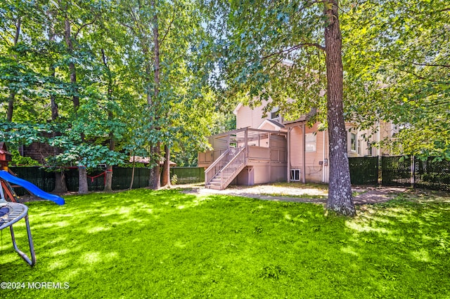 view of yard with a trampoline