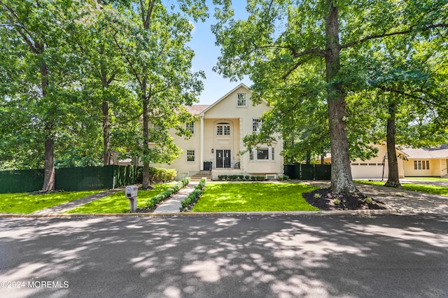 view of front of home with a front yard