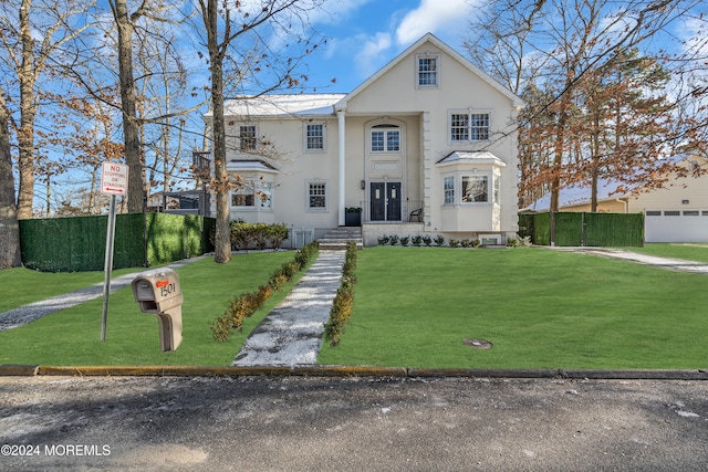 view of front of property with a front lawn