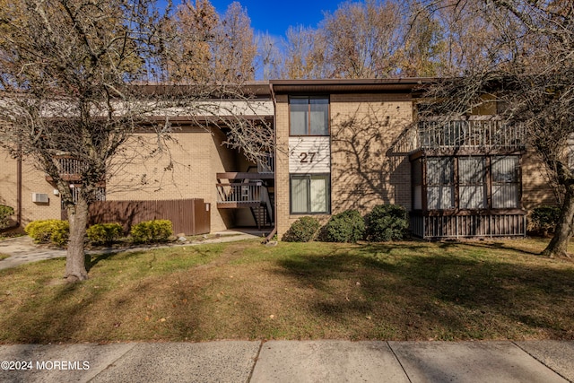 exterior space with a front yard