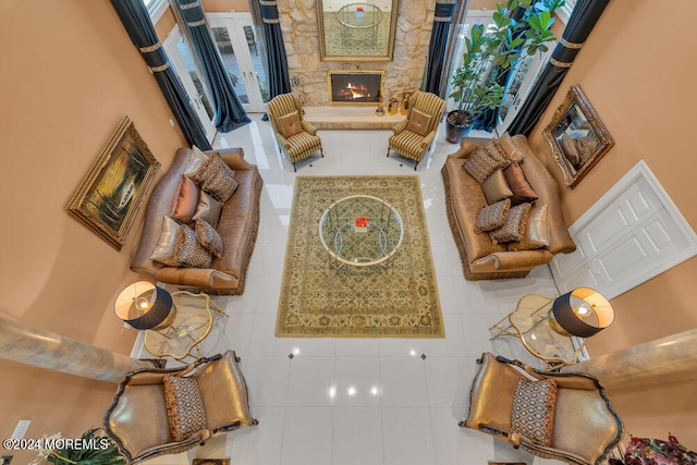 tiled living room with a fireplace