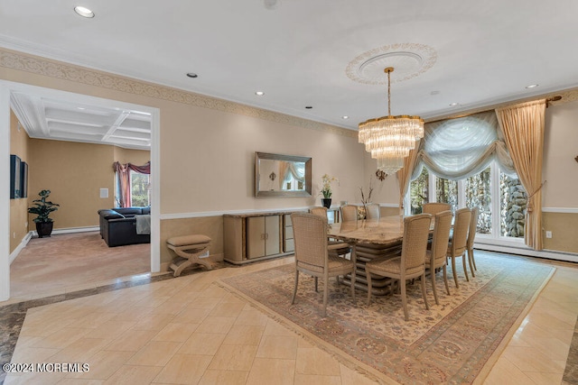 dining room with ornamental molding, a healthy amount of sunlight, coffered ceiling, and an inviting chandelier