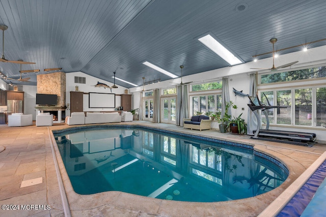 view of pool featuring ceiling fan