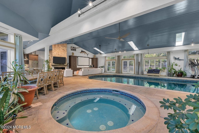 view of pool featuring ceiling fan and an indoor in ground hot tub