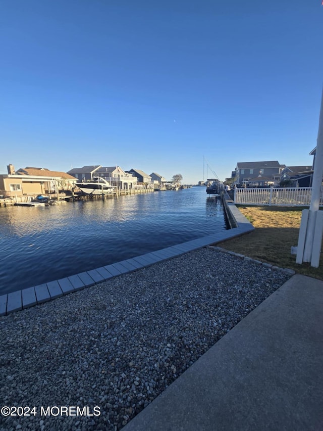 view of dock with a water view