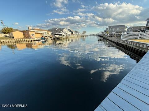 view of dock with a water view