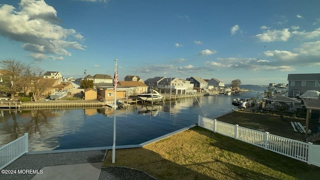 property view of water featuring a boat dock