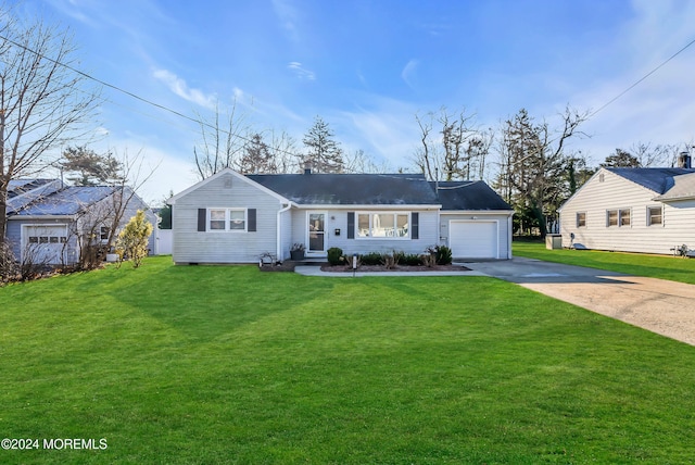 ranch-style house with a garage and a front yard