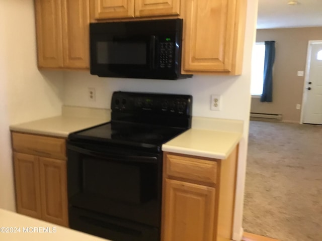 kitchen with light carpet, a baseboard heating unit, and black appliances