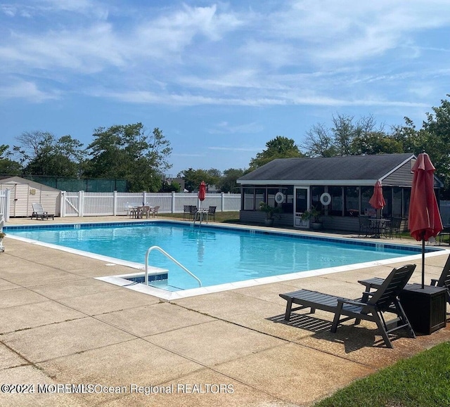 view of pool with a patio area