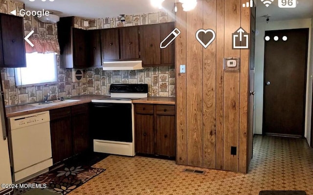 kitchen featuring tasteful backsplash, white appliances, sink, and dark brown cabinetry