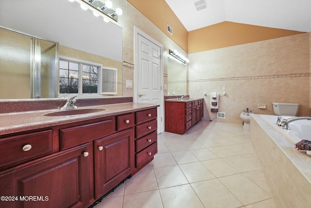 bathroom with vanity, a bidet, independent shower and bath, tile patterned flooring, and lofted ceiling