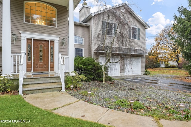 view of front of home with a garage