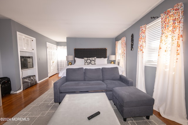 bedroom featuring dark wood-type flooring