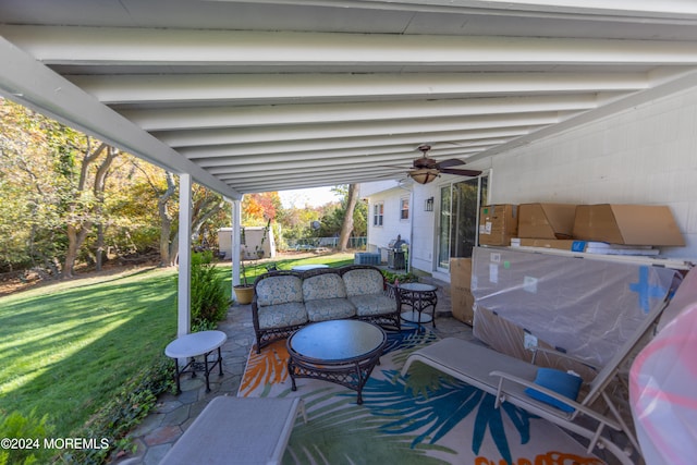 view of patio featuring ceiling fan and an outdoor hangout area