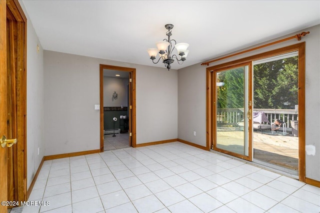 tiled empty room with a notable chandelier and a baseboard radiator