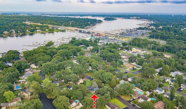 drone / aerial view with a water view