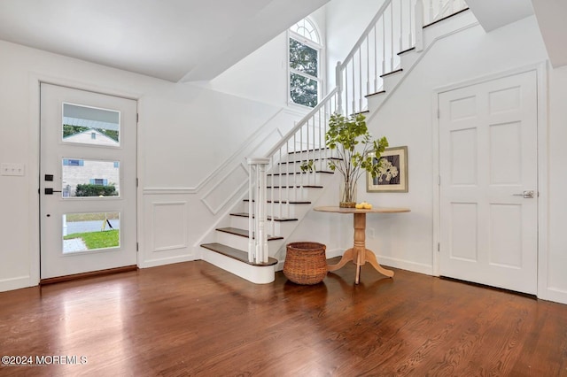 foyer with dark hardwood / wood-style flooring