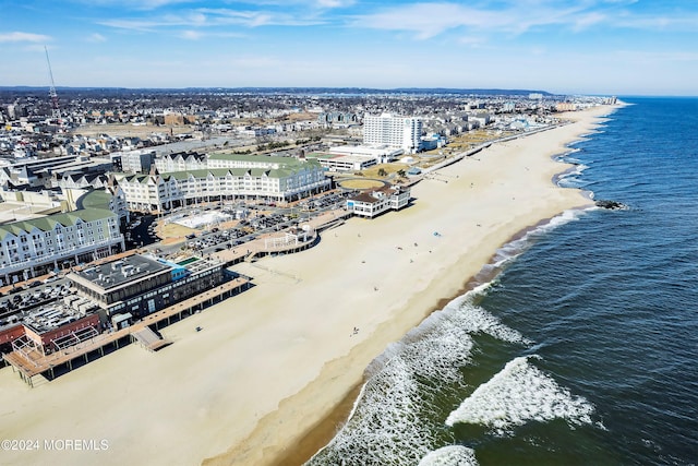 aerial view with a view of the beach and a water view