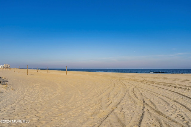 view of water feature with a beach view