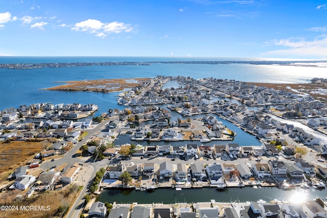 aerial view featuring a residential view and a water view