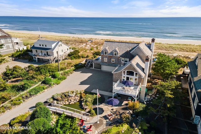 aerial view with a beach view and a water view