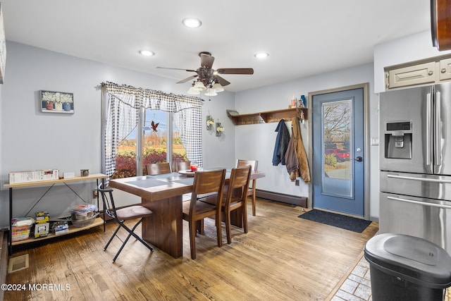 dining room featuring ceiling fan and light hardwood / wood-style flooring